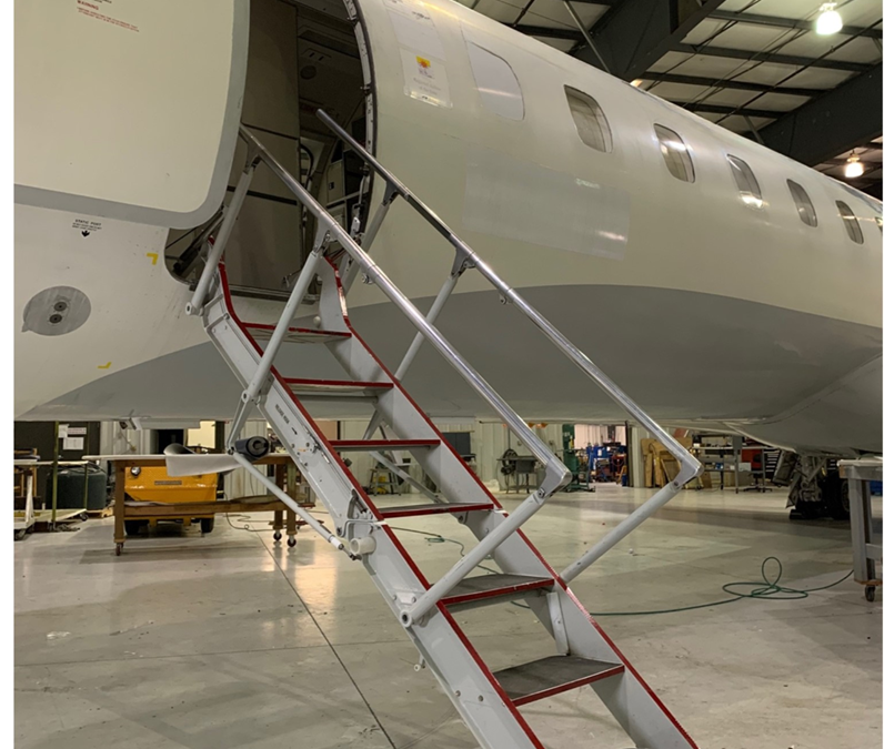 Worldwide Aircraft Services, Inc. partners with Regional One, Inc. on folding stair door installation.